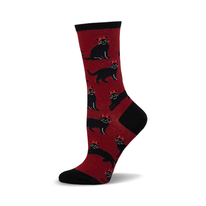 Crew socks in burgundy with a pattern of black cats wearing tiny red crowns. Black heel and toe. }}