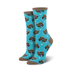 Pair of crew socks with a teal background featuring a repeating pattern of otters holding hands and small hearts.