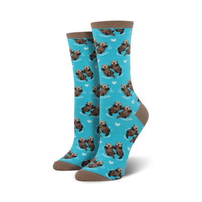 Pair of crew socks with a teal background featuring a repeating pattern of otters holding hands and small hearts.