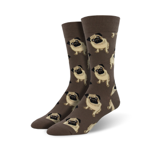 Pair of crew socks, brown with a repeating pattern of beige pugs. Comfortable and fun!