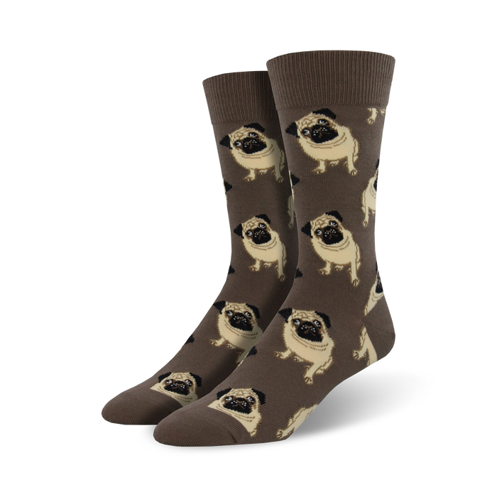 Pair of crew socks, brown with a repeating pattern of beige pugs. Comfortable and fun!