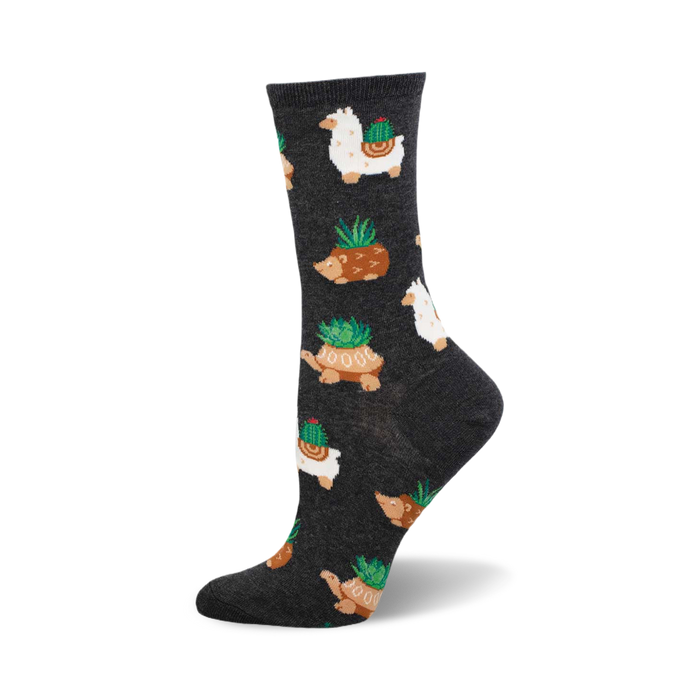 A side view of a charcoal grey crew sock with a repeating pattern of llamas, hedgehogs, and tortoises carrying succulents.