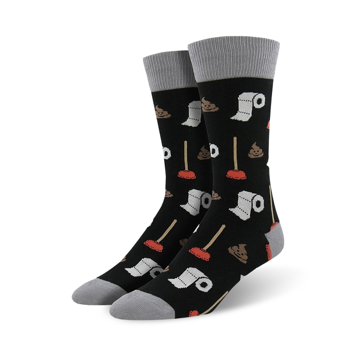 Pair of black crew socks with a fun potty-themed design. Features illustrations of plungers, toilet paper rolls, and poop emojis. }}