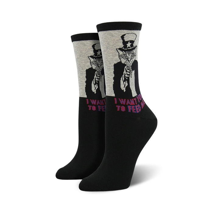 Crew socks in black and grey, featuring a graphic of a cat dressed as Uncle Sam pointing and saying 'I want you to feed me'. }}