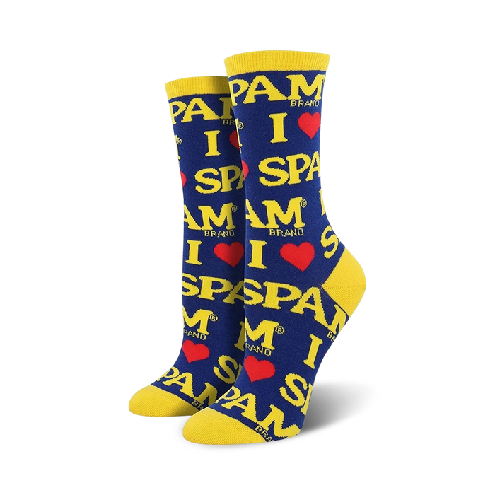 A pair of women's crew socks in navy blue and yellow. The socks feature a repeated pattern of 'I love Spam' in a yellow font with red hearts. }}