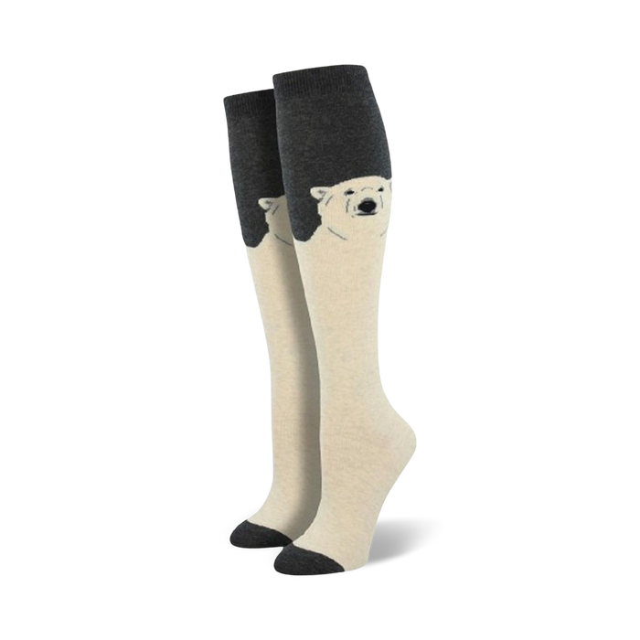Pair of cream and charcoal knee-high socks with a polar bear face design. }}