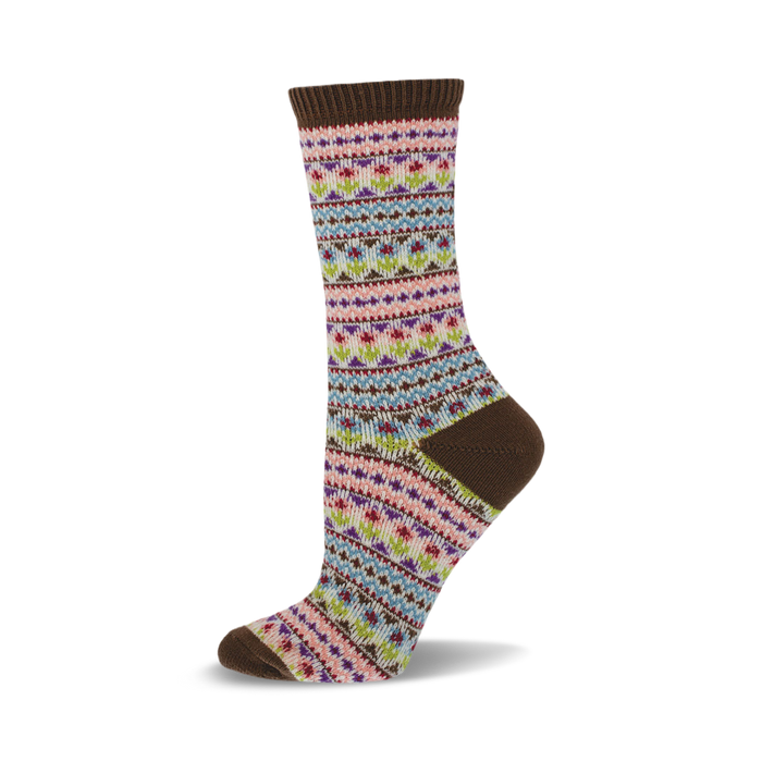 Brown crew socks with a pastel floral fair isle pattern. The colors include pink, purple, light blue, and green. }}