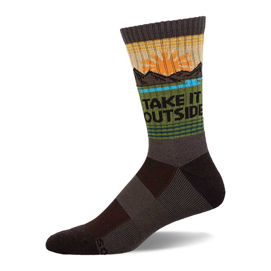 Crew sock in earthy brown, green, and yellow with a sun, mountains, blue water, and
