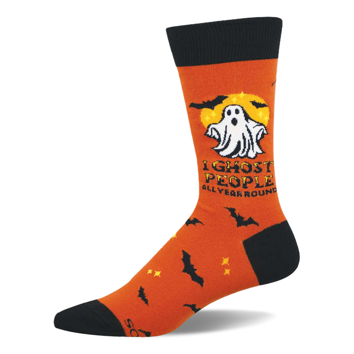 Orange crew sock with a white cartoon ghost, yellow full moon, black bats, and