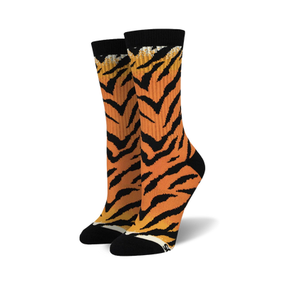 Pair of women's crew socks in orange and black with a tiger stripe pattern.