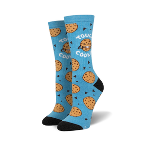 Pair of crew socks; light blue with chocolate chip cookies and grumpy cookie faces; black heel and toe.