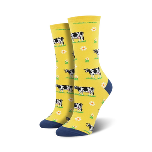 Lifestyle shot showing the yellow cow socks on a person's feet