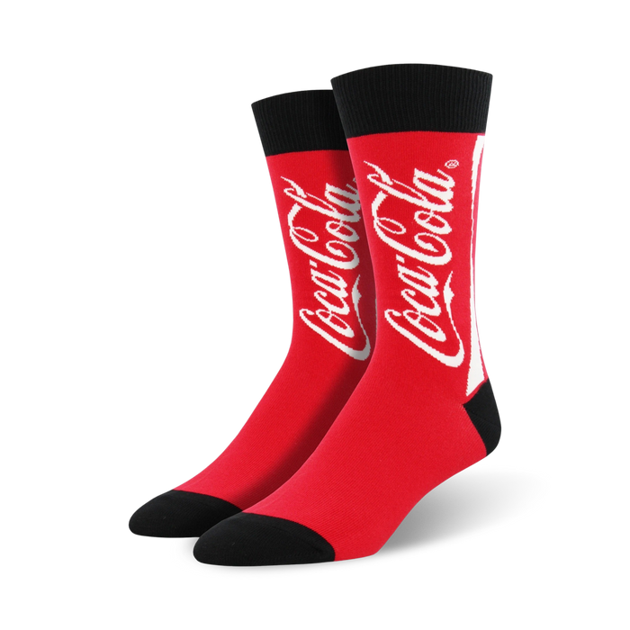 coca-cola socks in crew length, made for men with red color and a black toe/heel. the word coca-cola is splashed across the front in white.   }}