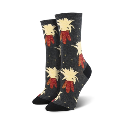 Pair of women's crew socks in dark grey and navy blue, featuring a whimsical pattern of illustrated corn stalks with red and beige details.