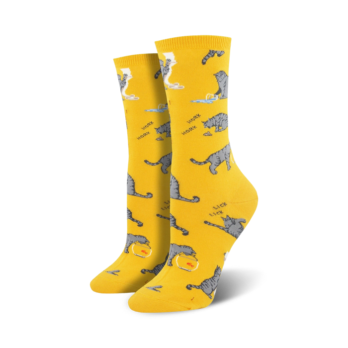 Pair of crew socks in yellow and light blue; featuring grey cats, fish bowls, and the words