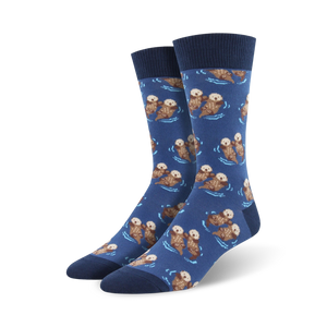 Lifestyle photo showing the blue otter socks on a person's feet; blue socks with brown otters.