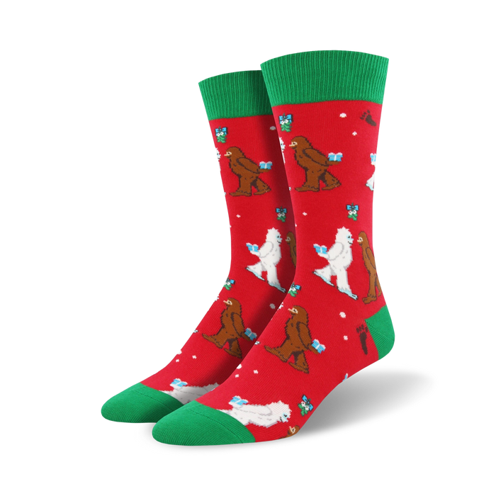 Crew socks in red with green cuffs. The design features Bigfoot and Yeti figures exchanging gifts in a playful Christmas scene. }}