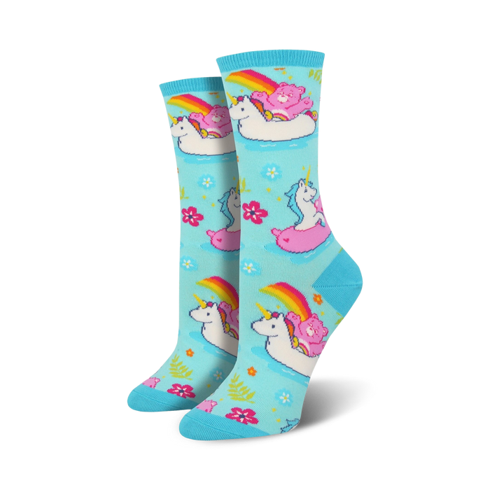 Crew socks in light blue featuring unicorns, Care Bears, and rainbows on inflatable swans. Pink, white, and rainbow accents on a pastel background. }}