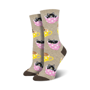 Crew socks in beige, pink & teal featuring black & brown kittens inside polka-dotted teacups.