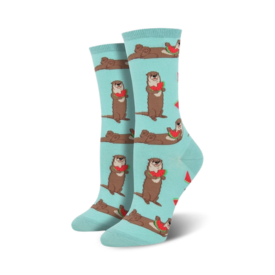 A pair of women's crew socks in teal. Otters holding watermelon slices are playfully printed against a light teal background.