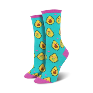 bright turquoise crew socks featuring a playful pattern of light green avocados with brown pits, accented with pink toes, heels, and cuffs.  