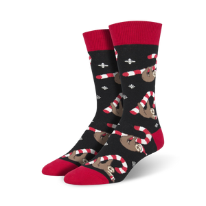 Lifestyle photo showing the Merry Slothmas socks on a person's feet, showcasing the overall look in a casual setting.