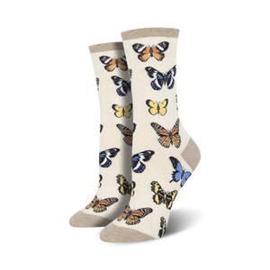 Close-up of women's crew socks in beige featuring a butterfly pattern.