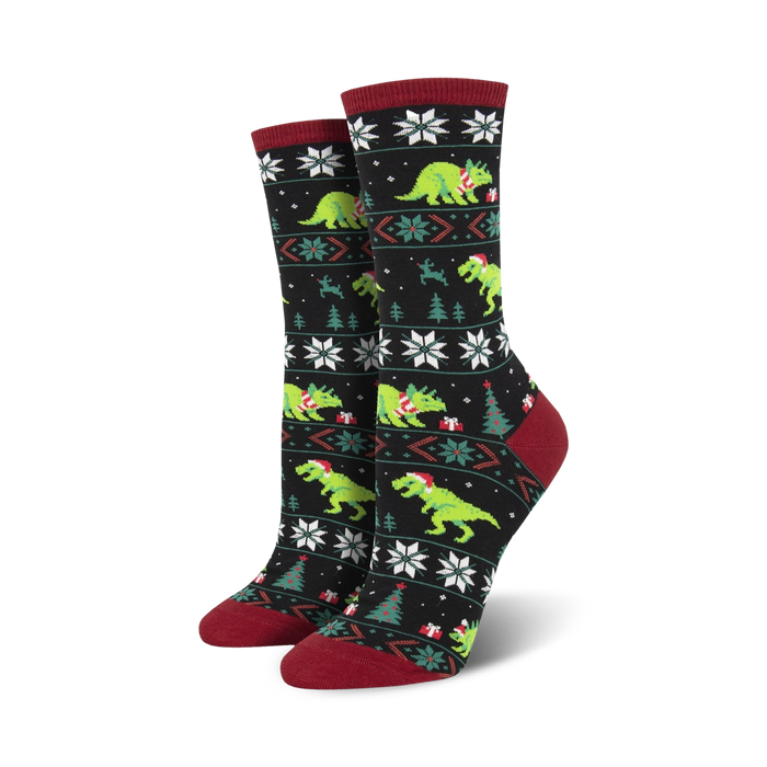 Crew socks in black and green featuring a Fair Isle pattern with T-Rex dinosaurs wearing Santa hats.