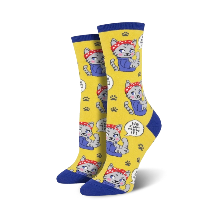 Crew socks in yellow and blue featuring a pattern of grey cats wearing red bandanas and flexing their biceps, with the phrase 'We Can Mew It!' repeated.