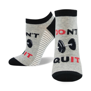 Close-up of gray and black 'Don't Quit, Do It' ankle socks with barbell design.
