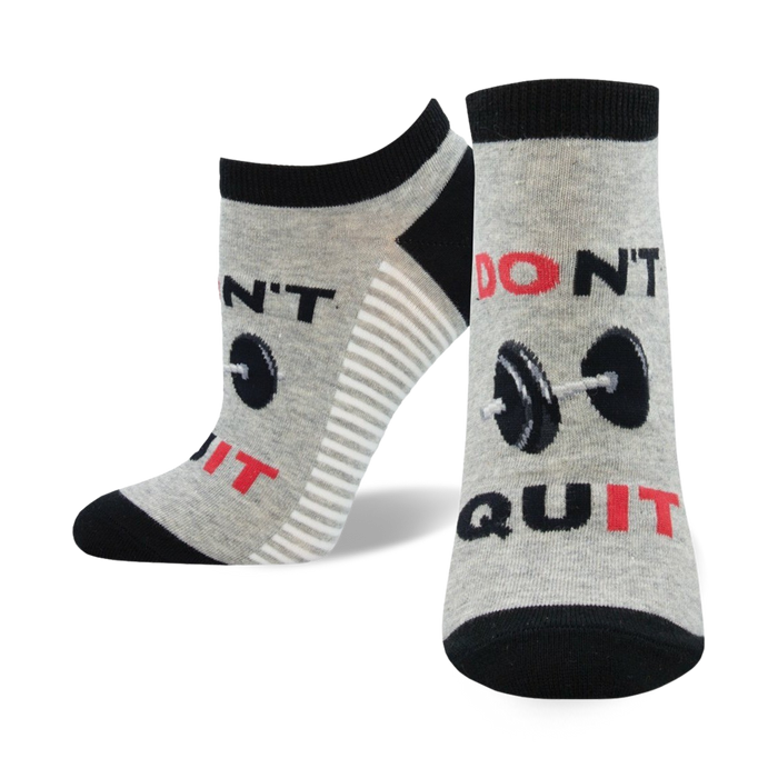 Close-up of gray and black 'Don't Quit, Do It' ankle socks with barbell design.