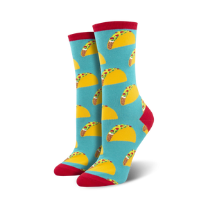 Close-up of teal crew socks with red cuffs and a repeating taco pattern.