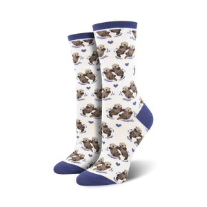 white crew socks for women have otters in the blue-green sea.  