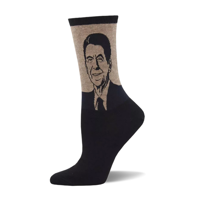 Crew sock with a black foot and a beige upper featuring a detailed, smiling portrait of Ronald Reagan in a suit and tie. }}