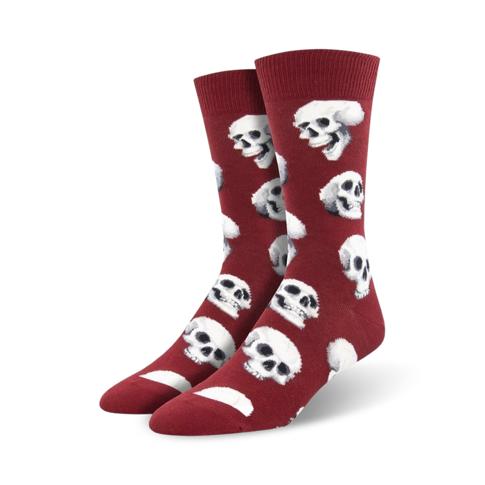 mens crew socks with realistic white skulls on a red background; halloween theme.   }}