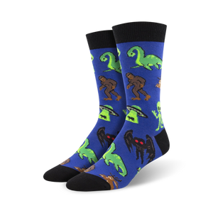Close-up of blue Cryptids socks showcasing the vibrant color and detailed design of the mythical creatures.