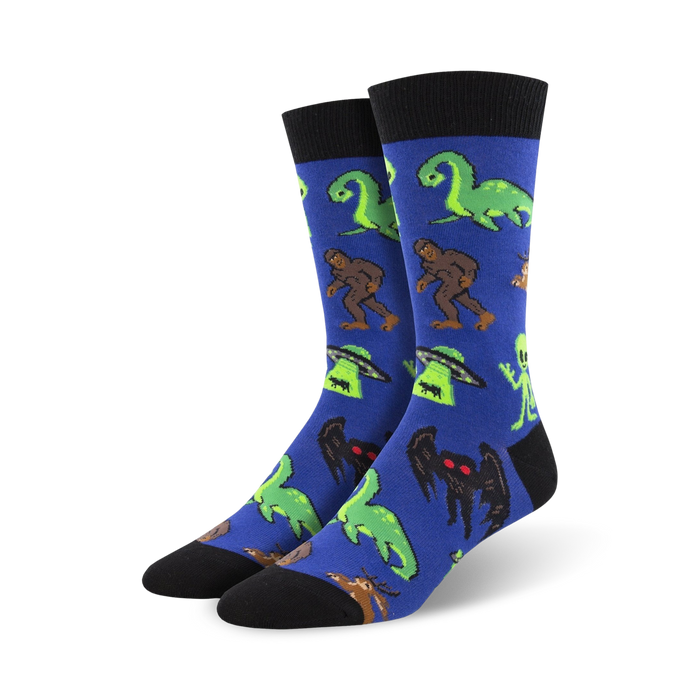 Close-up of blue Cryptids socks showcasing the vibrant color and detailed design of the mythical creatures.