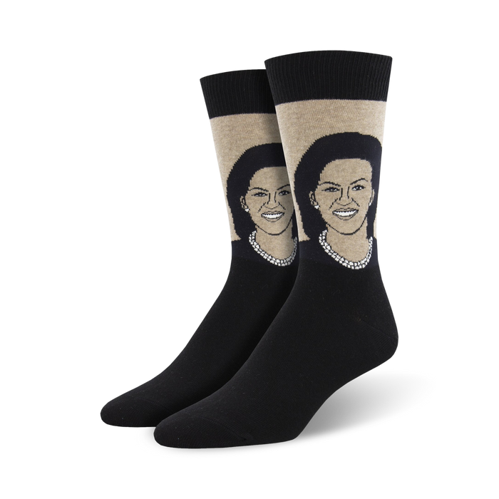 Pair of crew socks featuring a portrait of Michelle Obama. The socks are black with a beige panel showcasing the image and have a comfortable fit. }}