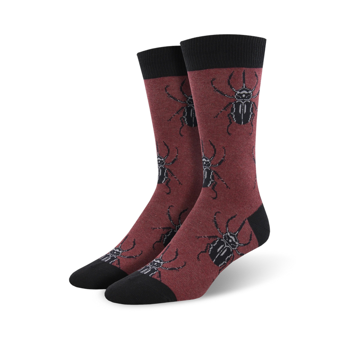 Burgundy crew socks with a repeating pattern of black stag beetles.  A stylish and fun design for adding a unique touch to any outfit. }}