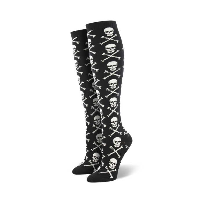 black knee high socks with white skulls and crossbones pattern, made for women. perfect for halloween.    }}
