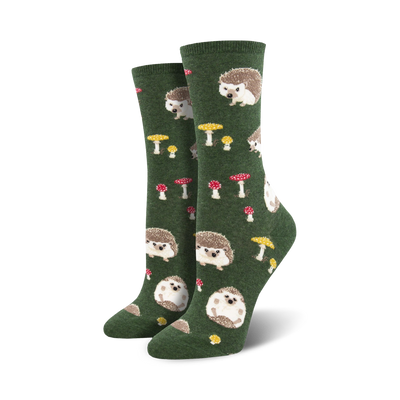 Pair of women's crew socks in green and burgundy. Feature a whimsical pattern of hedgehogs and mushrooms.