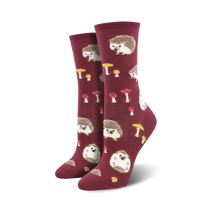 Lifestyle shot showing the burgundy Slow Poke socks on a model's feet.
