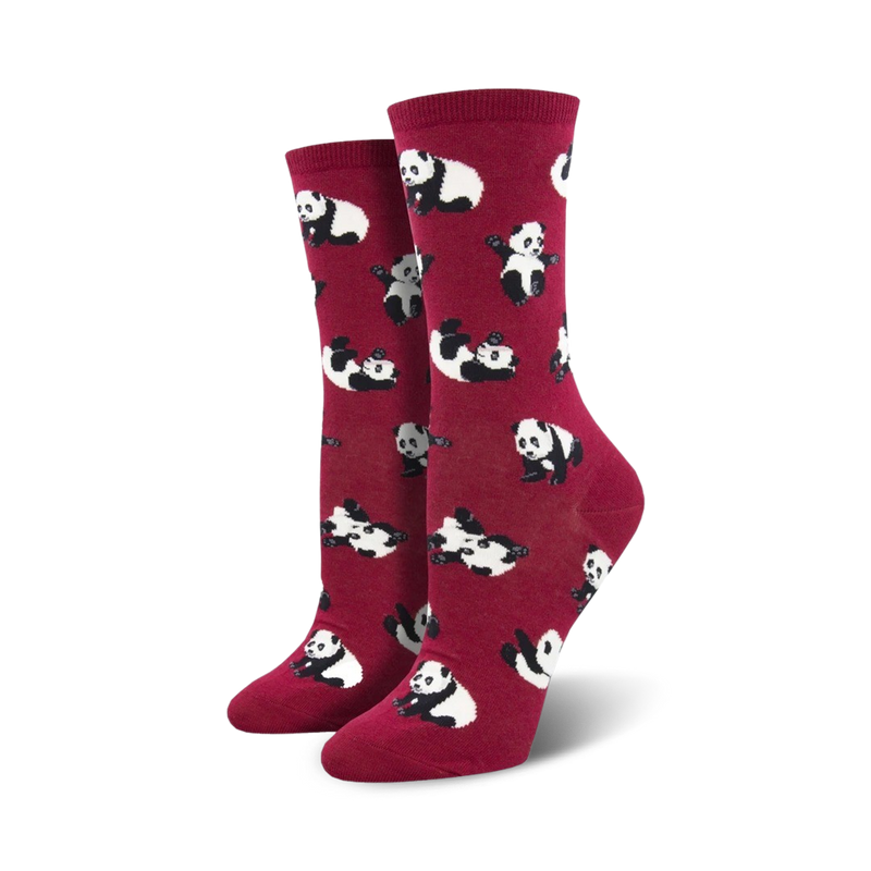 Pair of women's crew socks; burgundy background with a repeating pattern of playful pandas in black and white.