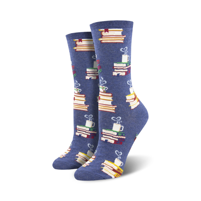 Pair of crew socks in blue and brown, showing stacks of colorful books and steaming mugs.  Literary-themed design.