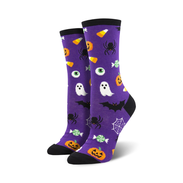 Purple crew socks with a Halloween theme.  Features ghosts, spiders, bats, pumpkins, candy corn, and eyeballs on a purple background. }}