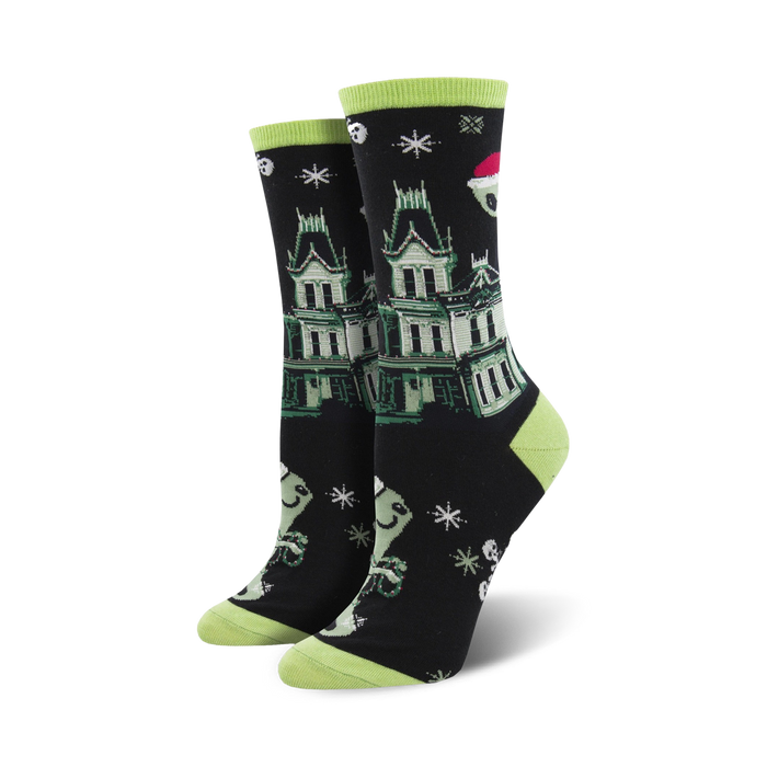 black crew socks with white snowflakes, green & white ghosts, and a haunted house, perfect for halloween.    }}