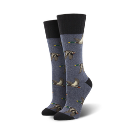 dark blue crew socks feature a pattern of flying brown and teal ducks.  