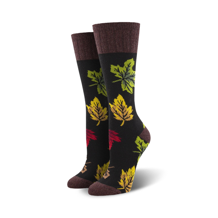 black crew wool socks with colorful maple leaf pattern. fall theme, unisex.  