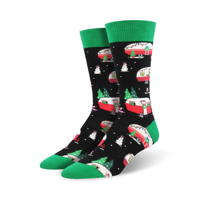 Pair of Christmas Campers XL crew socks. Black background with red and green Christmas campers, snowmen, and trees. Green cuffs. }}
