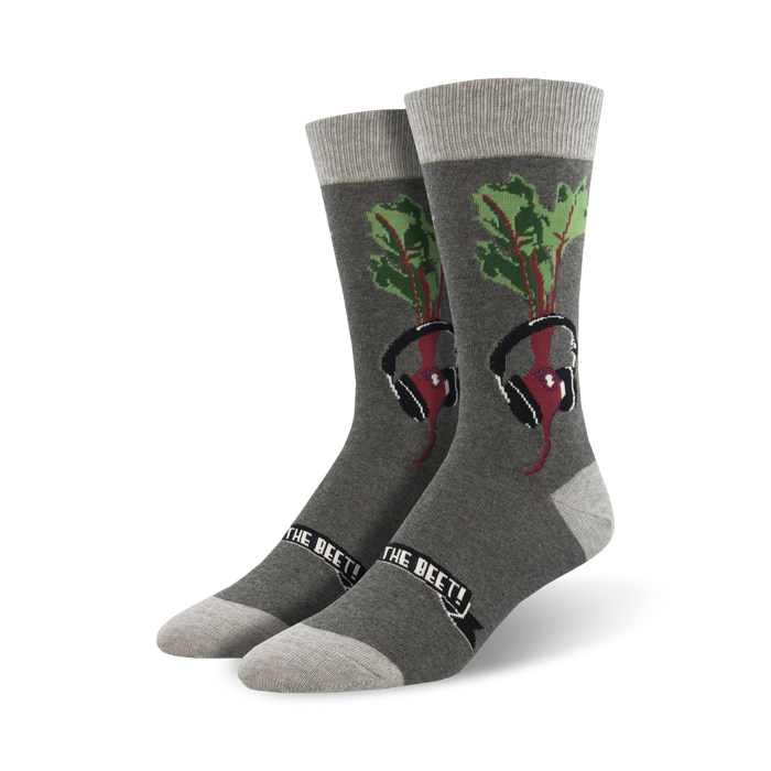 Pair of grey crew socks with a graphic of a beet wearing headphones. Features green beet greens and a black banner. }}